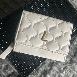 White Quilted TriFold Wallet With “L” Monogram Initial
